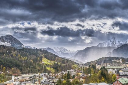 Bavarian alpine village covered in snow during early winter season