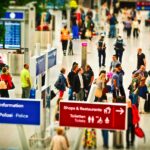 Passengers queuing at BER Airport check-in after cyberattack disruption