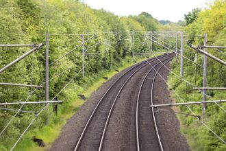 Deutsche Bahn workers renovating railway tracks during line closure in Germany