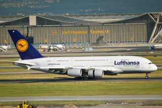 Lufthansa plane at Frankfurt Airport as debate over high aviation costs intensifies