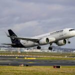 Lufthansa aircraft departing Frankfurt Airport with surcharges increasing ticket costs