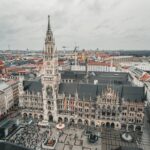 Apprentices leap into the Fischbrunnen fountain at Munich’s Marienplatz during the Metzgersprung tradition