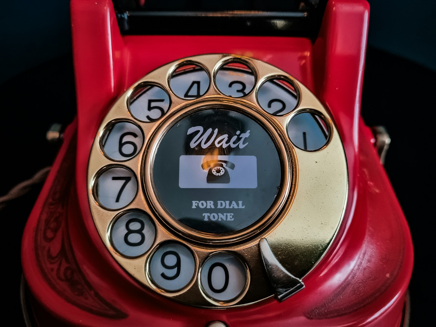 Senior using a traditional landline phone in Germany affected by Telekom tariff increase
