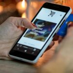 Smartphone with Temu and Shein apps highlighting online shopping growth in Germany