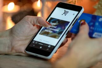 Smartphone with Temu and Shein apps highlighting online shopping growth in Germany