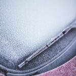 Frost-covered car in Bavaria during early autumn