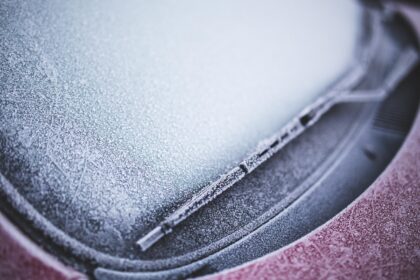 Frost-covered car in Bavaria during early autumn