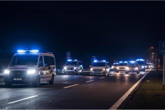 German police cars securing a road in Bavaria after suspected terror attack