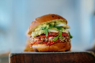 Plant-based burger with EU flag symbolizing new EU rules on meat alternative naming