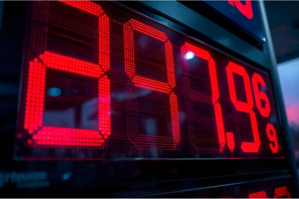 Digital price display at German petrol station illustrating fluctuating fuel costs