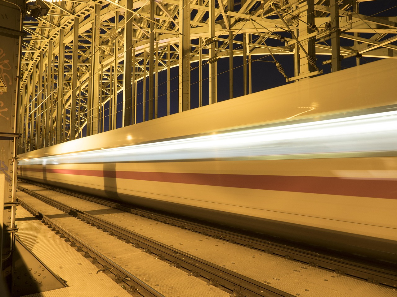 German ICE train on tracks at night after emergency stop