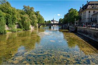 Low water level of the Isar River near Praterinsel in Munich during maintenance works.