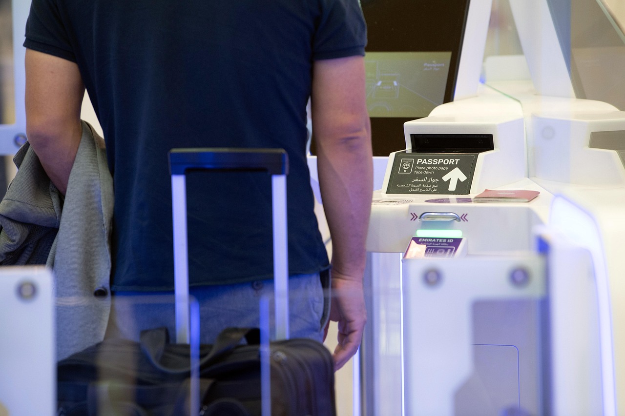 Passengers at Munich Airport security checkpoint with new CT scanners
