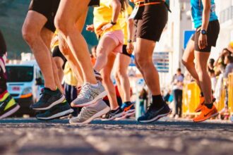 Thousands of runners cross central Munich landmarks during the 2025 Munich Marathon