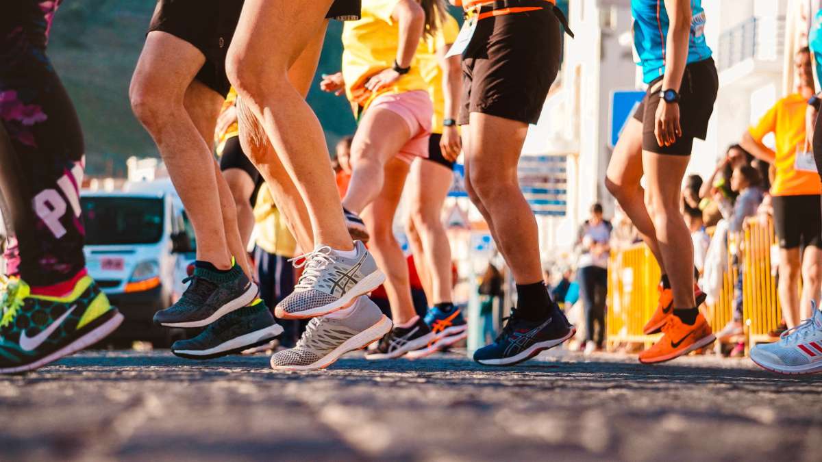 Thousands of runners cross central Munich landmarks during the 2025 Munich Marathon