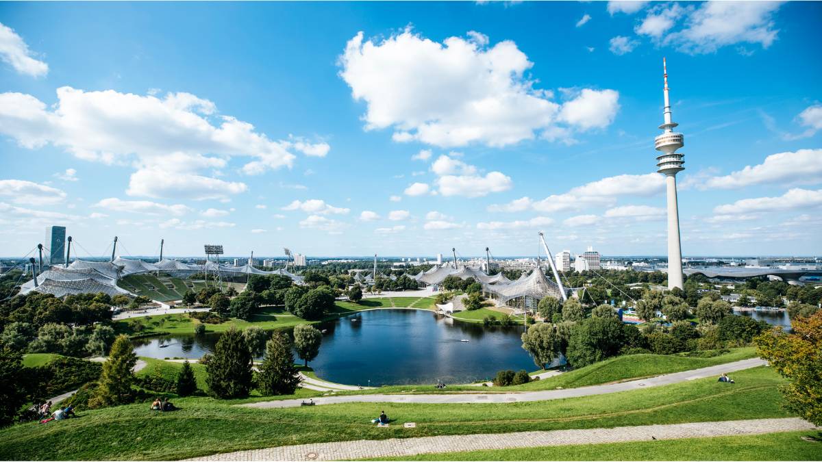 Munich Olympic Park and skyline representing debate over future Olympic bid and investments