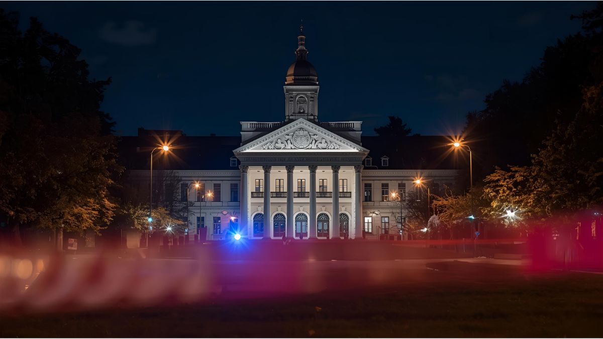 Police and paramedics at a Munich university building after a student’s fall from the second floor.