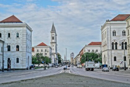 Derailed tram surrounded by emergency vehicles near Schwabinger Tor in Munich
