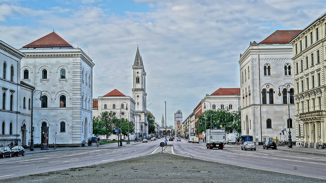 Derailed tram surrounded by emergency vehicles near Schwabinger Tor in Munich