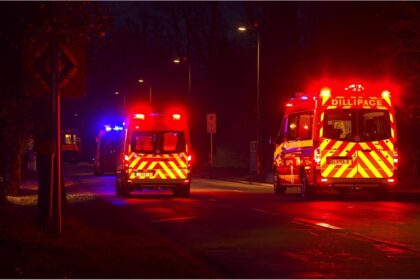 Police vehicles with blue lights during an emergency in Erding, Bavaria
