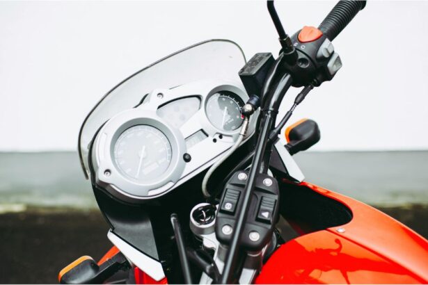 Pope Francis sits on a white BMW R18 motorcycle signed for charity auction