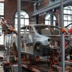 Volkswagen plant entrance with employees, Germany