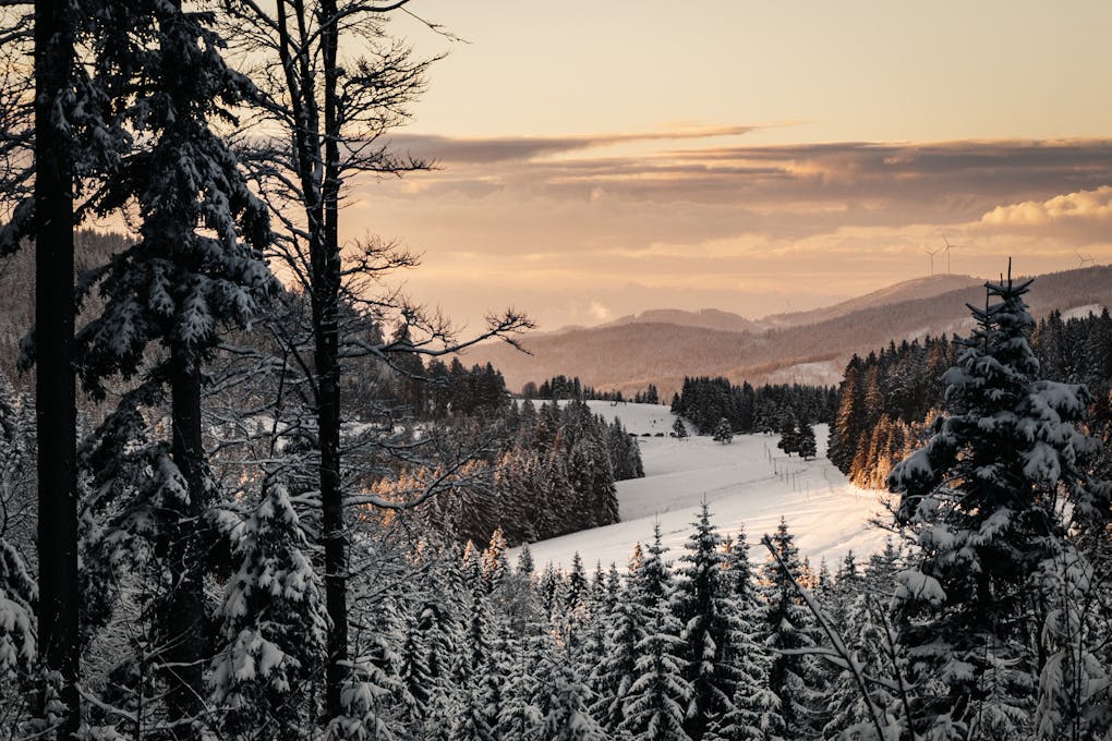 Snowy and icy road conditions in a German mountain region during early winter.