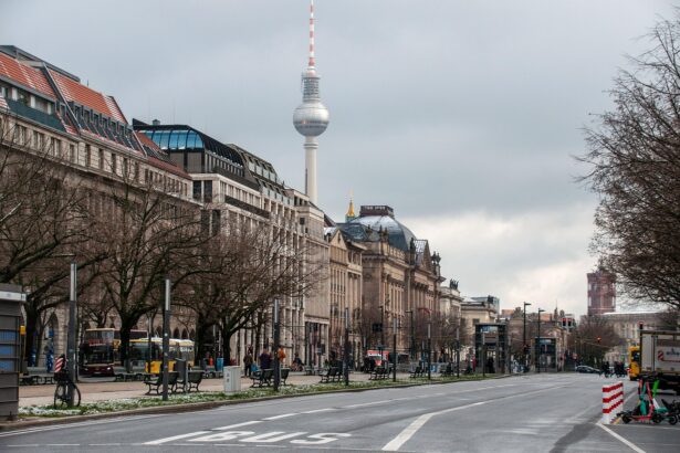 Aerial view of a busy German city road with cars and pedestrians highlighting traffic density.