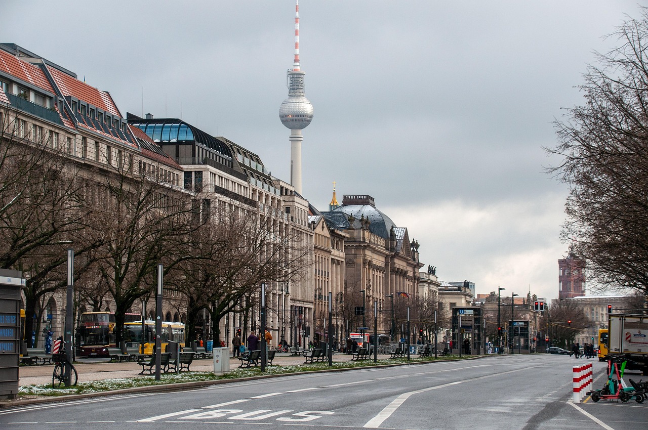Aerial view of a busy German city road with cars and pedestrians highlighting traffic density.