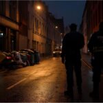 Undercover waste enforcement officers patrolling a Heilbronn street at night