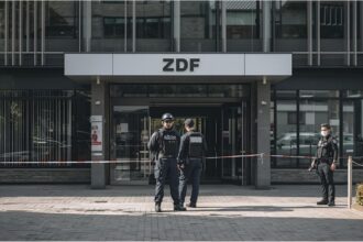 Police secure the ZDF capital studio in Berlin after a protest incident